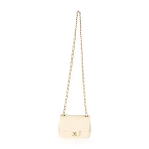 CHANEL Beige Quilted Lambskin Mini Square Classic Flap Bag
